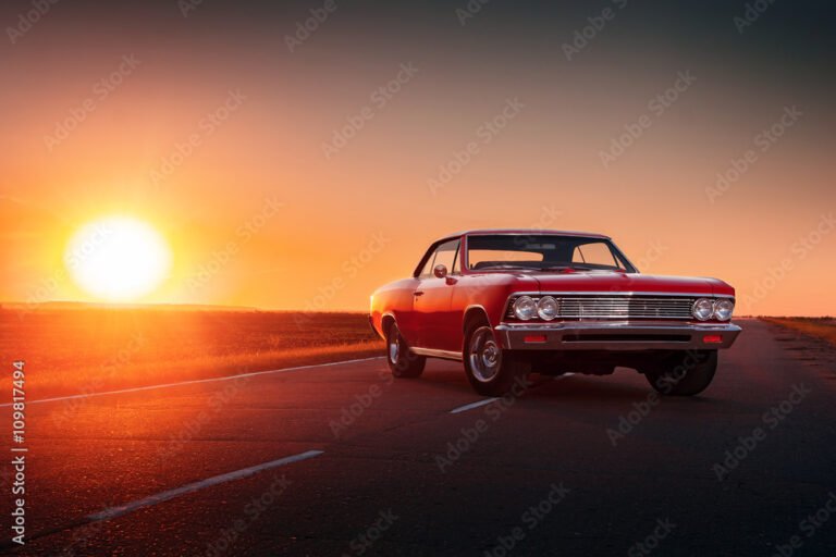 carro novo em estrada ao por do sol